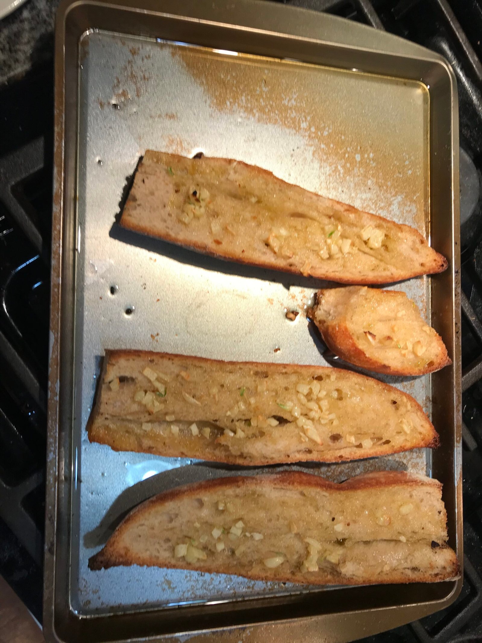Garlic bread toasted in a pan